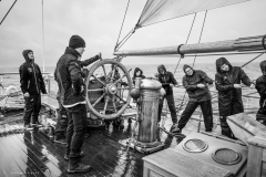 Hauling in the rain on the aft deck