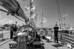 The captain talking to the pilot on the aft deck