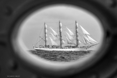 Dar Młodzieży through a porthole 